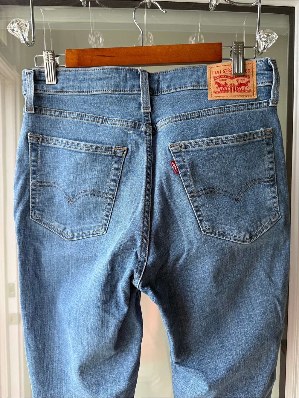 Levi's Women's Light Blue Denim Jeans - Classic Back Pocket Design